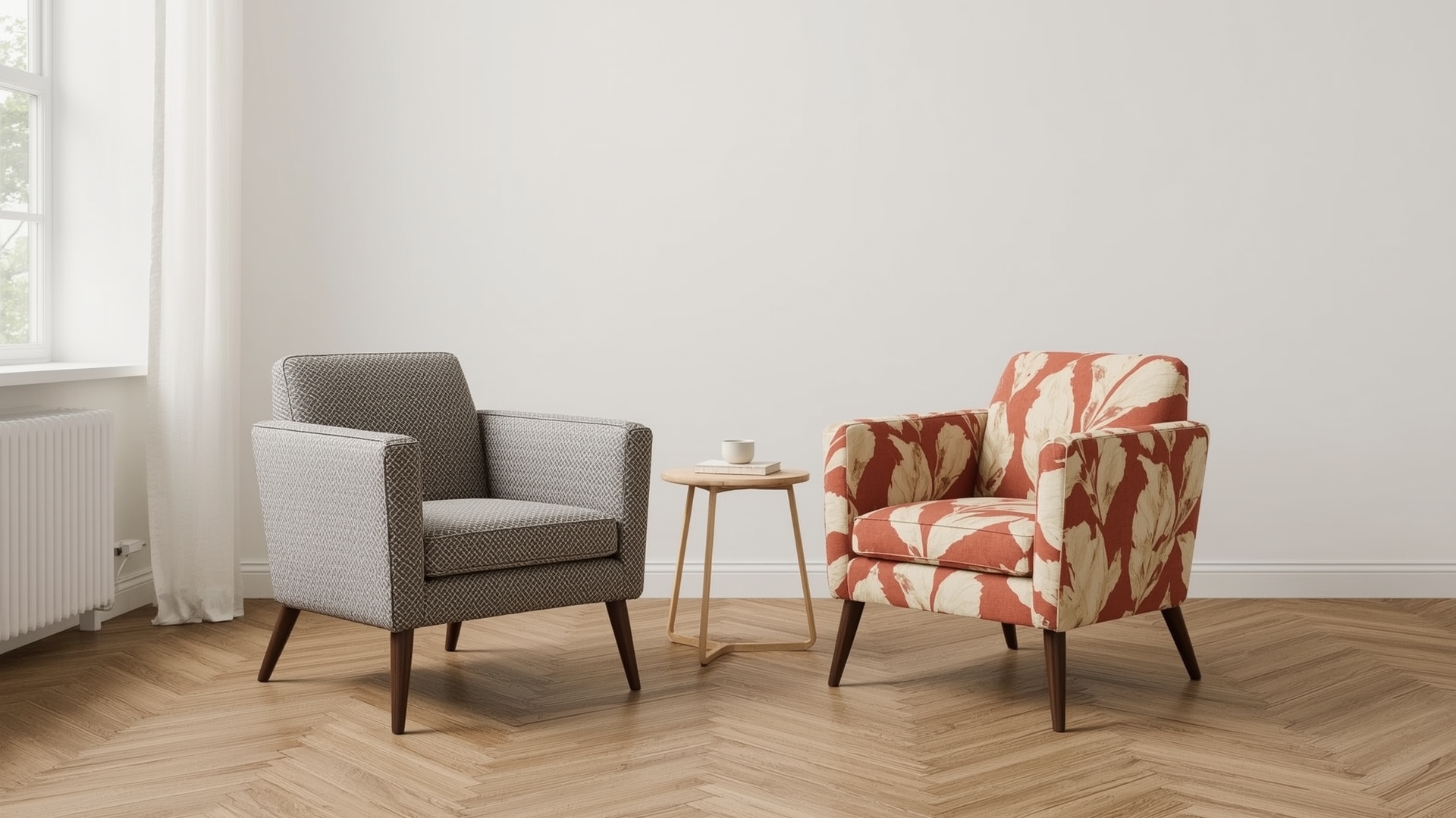 Two accent chairs upholstered in small and large pattern repeat fabrics in modern studio